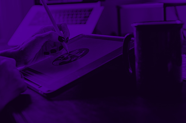 designer drawing on tablet